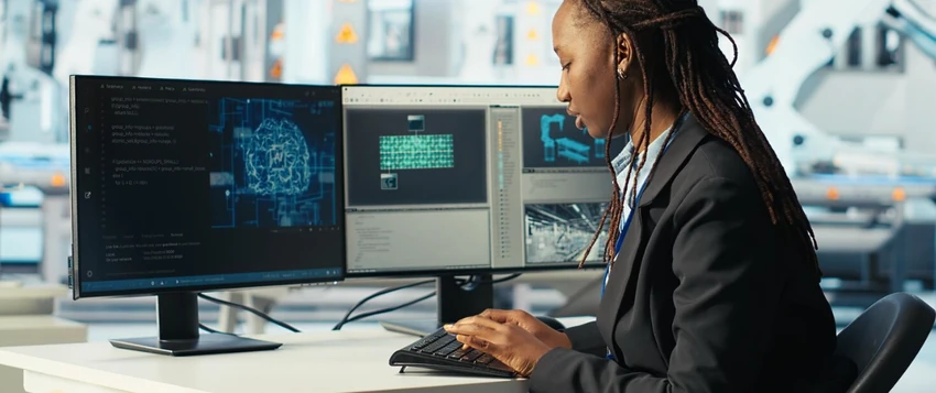 Cybersecurity professional working on security dashboards and digital systems