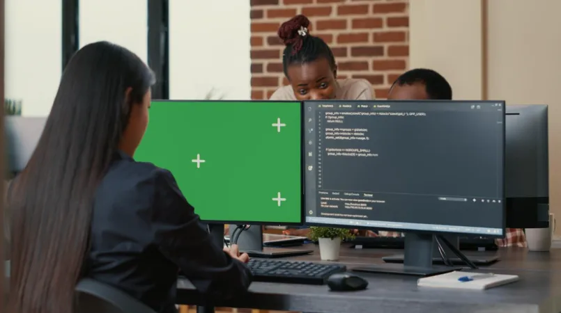Students learning coding and computer science skills in a technology classroom