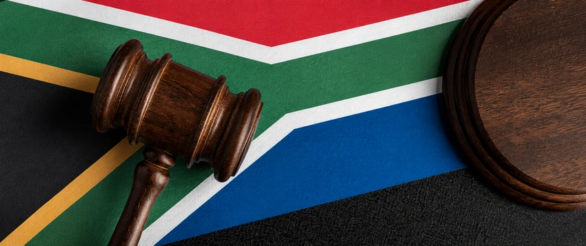 Gavel on the South African flag representing the Madlanga Commission, constitutional accountability and the rule of law