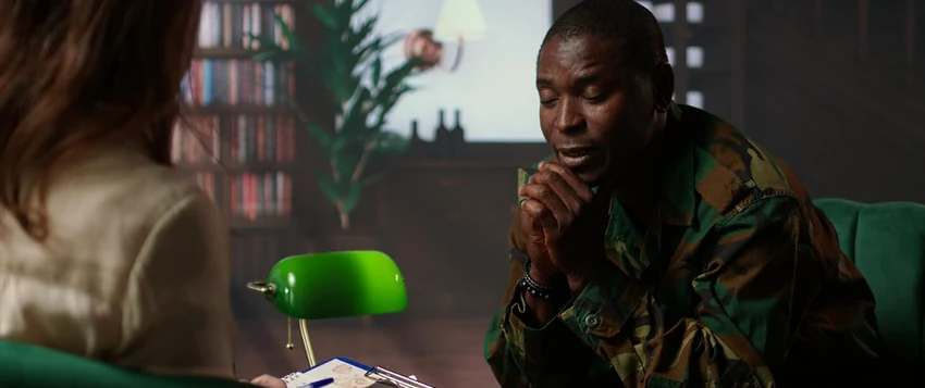 Man receiving mental health first aid support during a private conversation
