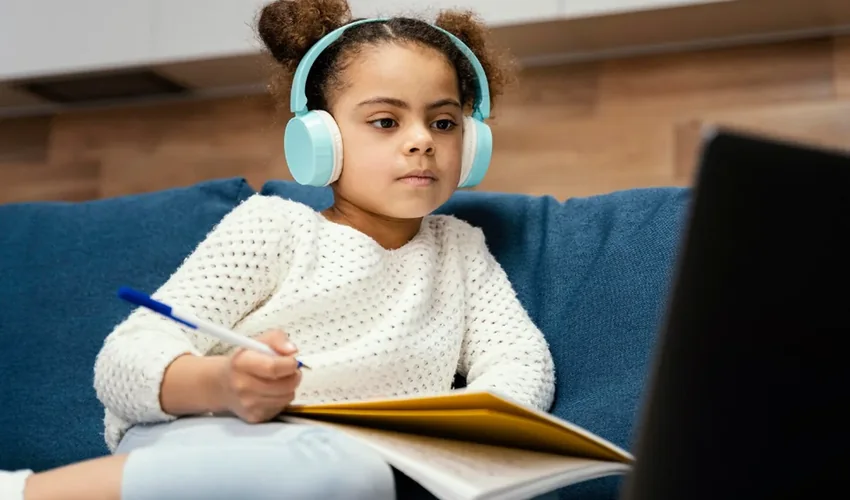 Student completing independent online schoolwork at home